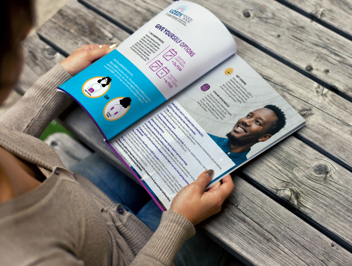 Over the shoulder view of a woman reading a brochure